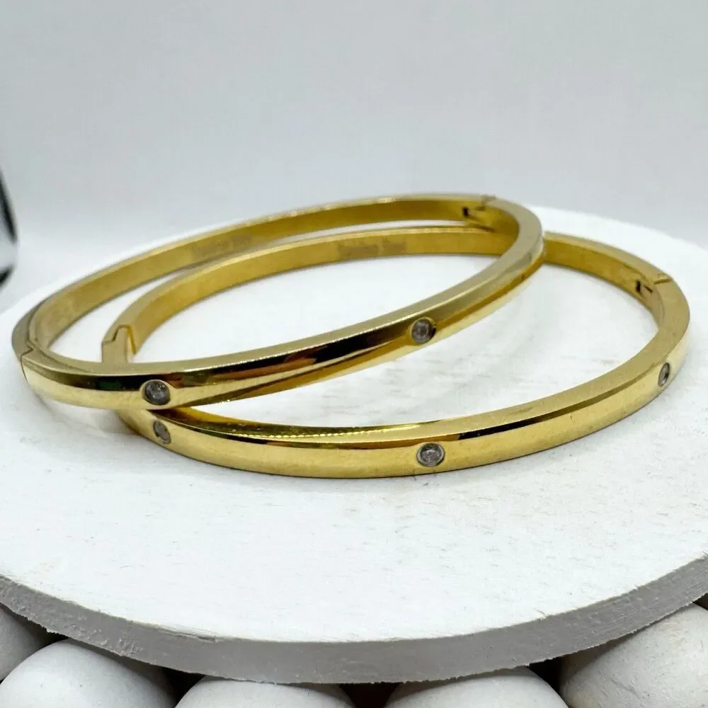 2 Gold Tone Bangle Bracelets With Rhinestone Details Stainless Steel Hinged